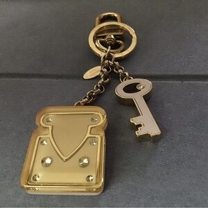 Louis Vuitton Gold Keychain with Circular Design